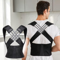 Man wearing a black Posture Corrector Pro brace with crossover straps and full back panel, front and back view